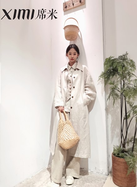 女士風(fēng)衣中長款