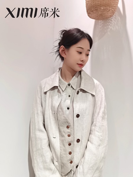 女士風(fēng)衣中長款